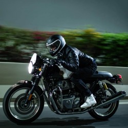 Tucking in riding position on the Royal Enfield Continental GT