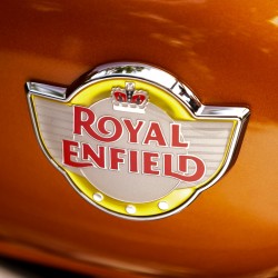 Royal Enfield badge on a Orange Crush fuel tank - Royal Enfield Interceptor
