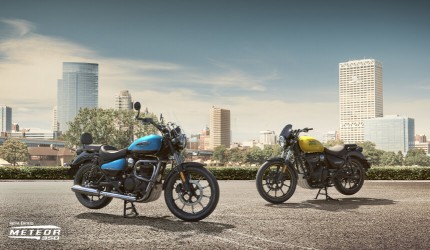 Two Royal Enfield Meteors; left in Supernova Blue, right in Fireball Yellow